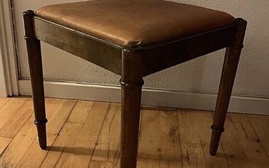 A Danish mahogany stool with leather seat. Dated on the underside “1848”. 19th century H. 35 cm. 38×38 cm.