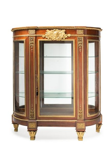 A French gilt-bronze vitrine cabinet
