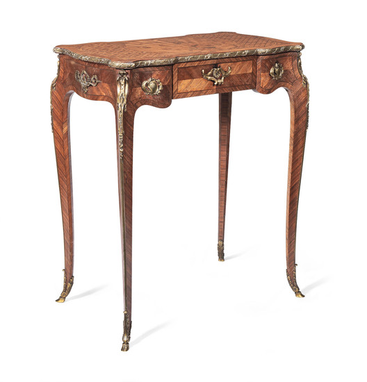 A French late 19th century gilt bronze mounted kingwood, bois de bout marquetry and parquetry table a ecrire