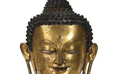 A GILT-BRONZE BUDDHA HEAD