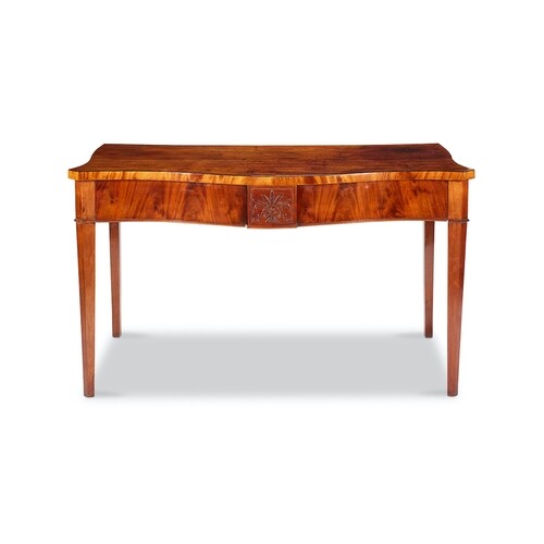 A George III mahogany serpentine serving table Inlaid with e...