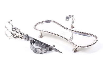 A George III silver shaped oblong and beaded snuffers stand.