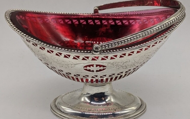 A George III silver sugar basket, pierced and etched...