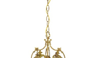 A George III style gilt-bronze hall lantern, late 19th century, of square form, the frame with scrolls, foliate and shell decoration, two glazed panels with cut-star motif, 60cm high It is the buyer's responsibility to ensure that electrical items...