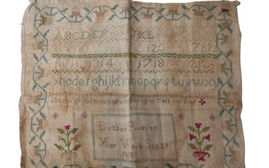 A George IV textile sampler, by Esther Reeves and dated 1828...