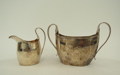 A Georgian silver twin handled sugar bowl, 19cm long and sim...