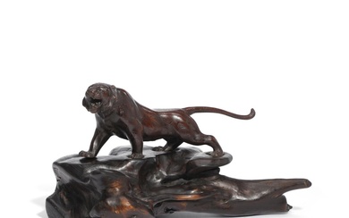 A Japanese redpatinated bronze tiger. On stand of Keyaki træ. Weight 2354...