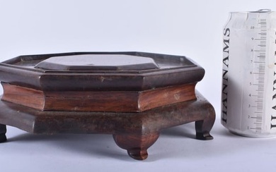 A LARGE 19TH CENTURY CHINESE CARVED WOOD HEXAGONAL STAND Qing, possibly Huanghuali. 19 cm wide.