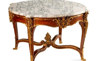 A Louis XV Style Gilt-Bronze-Mounted Kingwood Table de