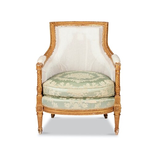 A Louis XVI style carved giltwood bergère The rectangular pa...