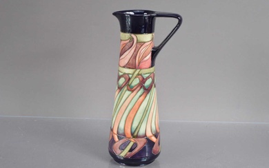 A Moorcroft Pottery "Tulip Weaver" trial ewer shape vase dated 19-5-10