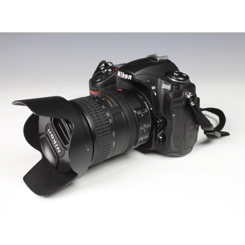 A Nikon D300 DSLR Digital Camera with AF-S Nikkor 18-200mm l...