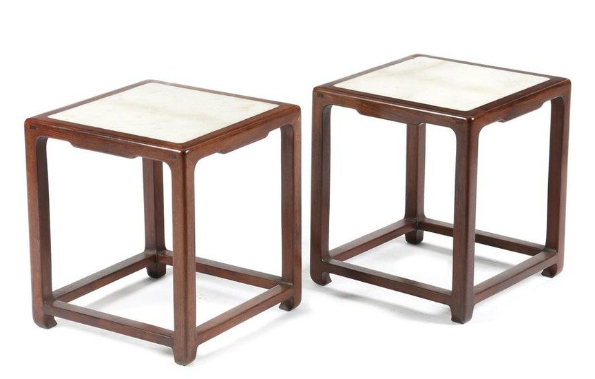 A PAIR OF CHINESE HARDWOOD STOOLS IN MING...
