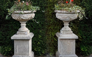 A PAIR OF COMPOSITION STONE PEDESTAL URNS ON PLINTHS, LATE 20TH CENTURY