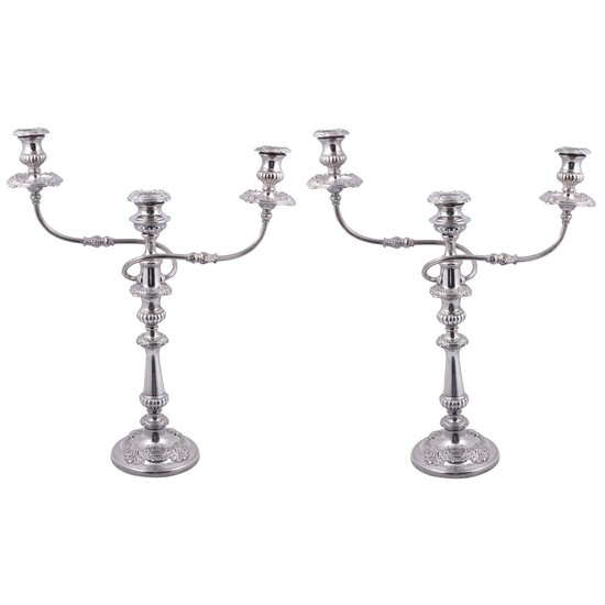 A PAIR OF GEORGE III SILVER AND SHEFFIELD PLATE CANDELABRA