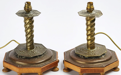 A PAIR OF SWEDISH EMBOSSED BRASS CANDLESTICKS