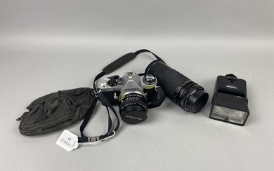 A PENTAX CAMERA WITH LENSES AND ACESSORIES