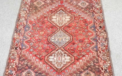 A Persian rug, with three central diamonds, 150 x 120cmCondition...