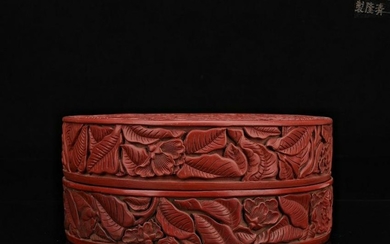 A RED LACQUER BOX WITH FLOWERS CARVING