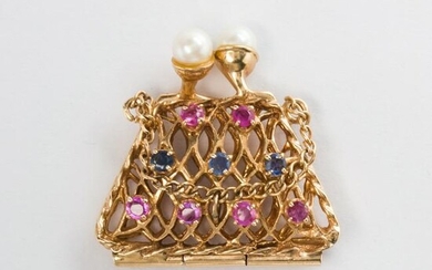 A Retro gemstone and fourteen karat brooch and charm