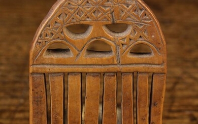 A Small 18th/19th Century Boxwood Loom Comb, decorated with chip carving, 3¾'' x 2¼'' (9.5 cm x 5.5