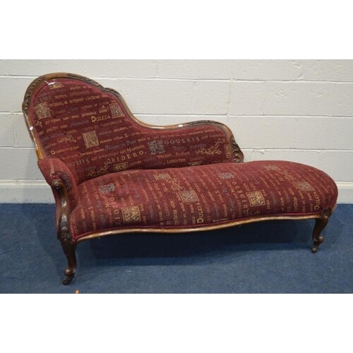 A VICTORIAN WALNUT CHAISE LONGUE, with a serpentine front, o...