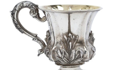 A William IV silver christening cup, London, 1831, Charles Fox II, designed with applied foliate strapwork to fluted body and raised on a shaped foliate foot, the interior gilded and the handle decorated with acanthus tip and laurel swag, 9.2cm...