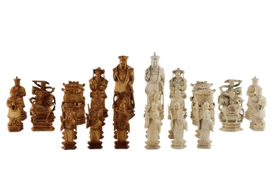 A beautiful set of Chinese ivory chess pieces. The turn...
