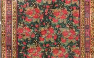 A beluchi rug with floral field, 240 x 157cm