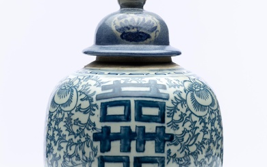 A blue and white ginger jar decorated with Chinese character mark with finial lid, height 32cm