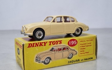 A boxed Dinky Toys No.195 cream Jaguar 3.4l, Nr M-M, box sup...
