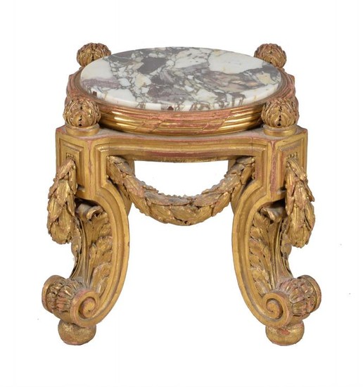 A carved giltwood and marble inset urn stand