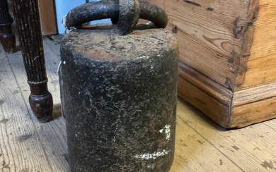 A cast iron 56lb weight.Condition Report There is no condition...