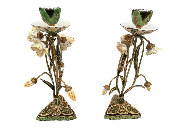 A couple of floral Porcelain and bronze candlesticks