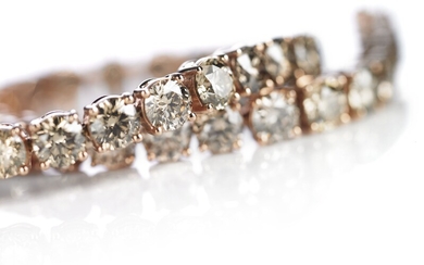 A diamond bracelet set with numerous brilliant-cut Champagne-coloured diamonds weighing a total of app. 15.70 ct., mounted in 18k pink gold. VS-SI.