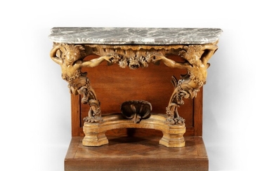 A flemish carved lacquered oak console, mid 18th century | Console aux indiens en chêne sculpté et laqué, travail flamand du milieu du XVIIIème siècle