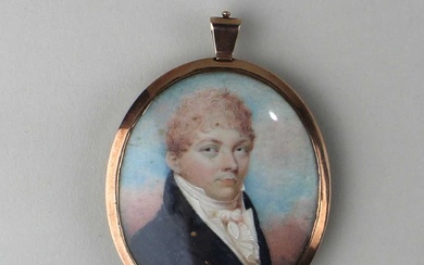 A gold mounted oval portrait miniature of a gentleman
