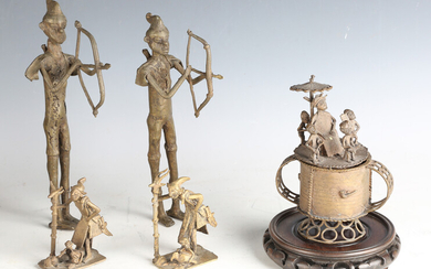 A group of West African bronze figures and a similar jar and cover, height 19cm.