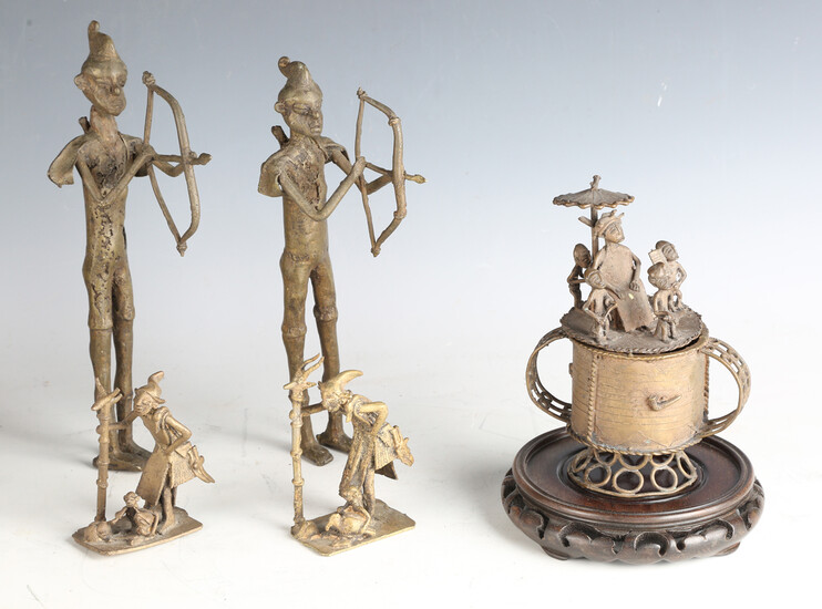 A group of West African bronze figures and a similar jar and cover, height 19cm.