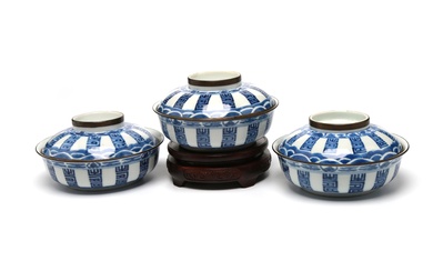A group of blue and white porcelain covered bowls painted with Shou Characters