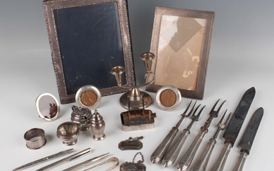 A group of silver, including a George V rectangular photograph frame, London 1912 by Mappin & We