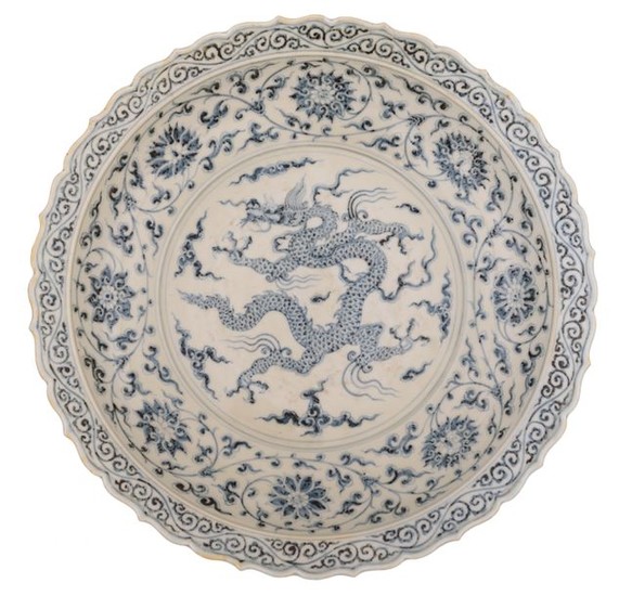 A large Chinese blue and white charger with...