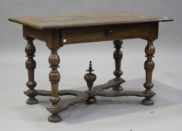 A late 17th/early 18th century Continental walnut side table, fitted with a drawer, raised on turned