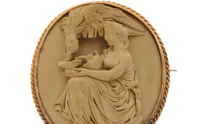 A late 19th century gold lava cameo brooch, carved to depict...