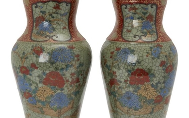 A pair of Chinese stoneware celadon vases, 19th century, each enamelled with peonies and chrysanthemum on branches, the waisted neck with similarly decorated panels set within a red ground gilded with scrolls and flowers, 37cm H. (2) 十九世紀...