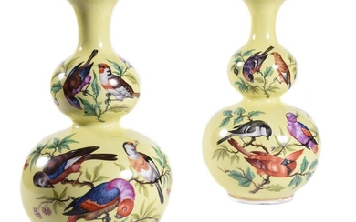 A pair of Dresden yellow ground double gourd vases painted with various birds