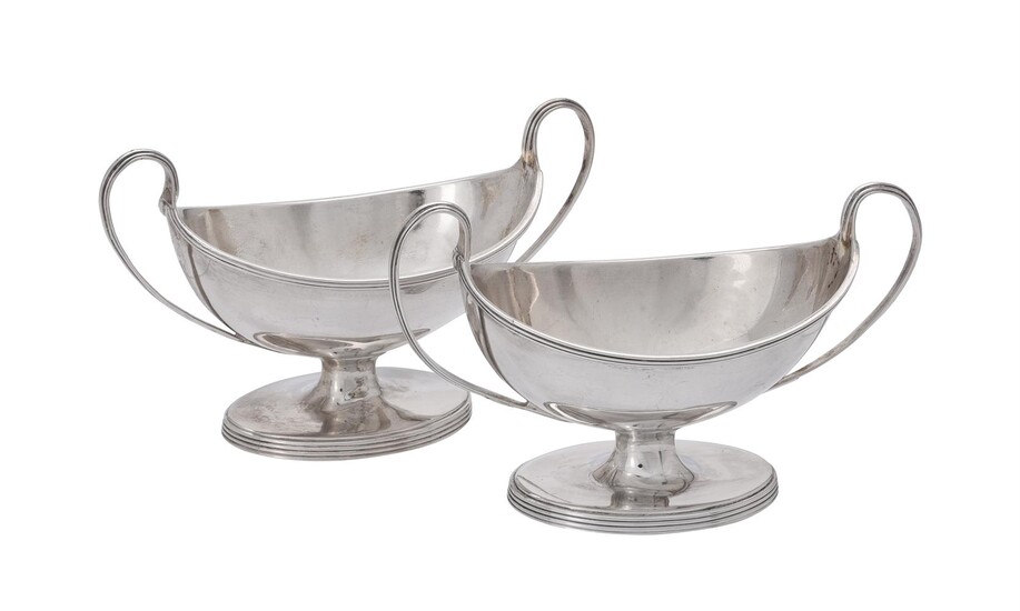 A pair of George III oval twin handled salt cellars by Henry Chawner