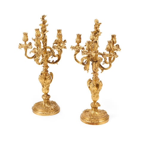 A pair of Louis XV gilt bronze five-light candelabra