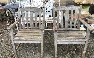 A pair of Pagoda Furniture weathered teak garden armchairs, ...