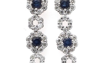 NOT SOLD. A pair of ear pendants each set with three sapphires encircled by numerous diamonds, mounted in 14k white gold. (2) – Bruun Rasmussen Auctioneers of Fine Art